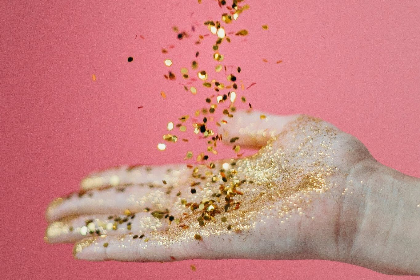Person Catching Glitters